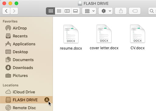 screenshot of clicking the eject button next to a flash drive